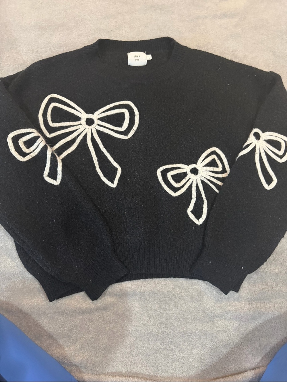 Luna Ivy Black Crewneck Sweater with White Bow Motif